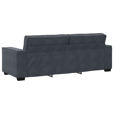 Back view of blue-gray sectional/sofa showing long configuration with cushions and legs.