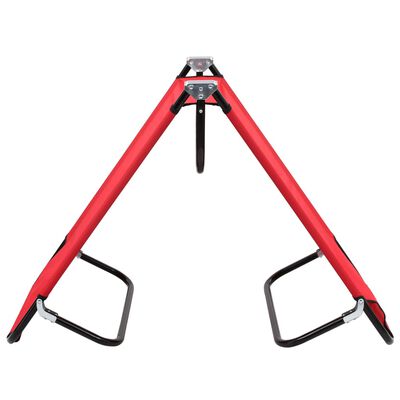 Close-up of red cot frame top with joint hardware.