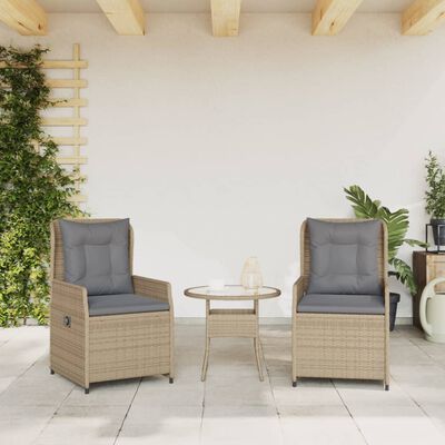 Outdoor seating arrangement with two beige armchairs and a small round table between them