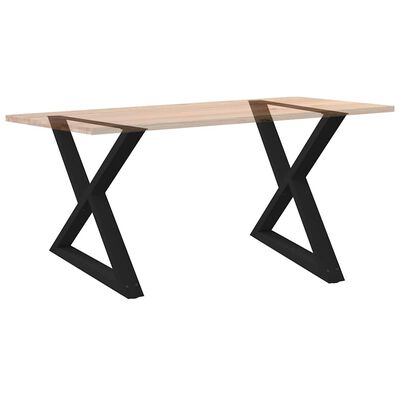 Finished desk with wooden top supported by black X-frame legs