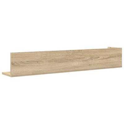 Back or side view of a long wooden wall shelf showing depth and end cap.