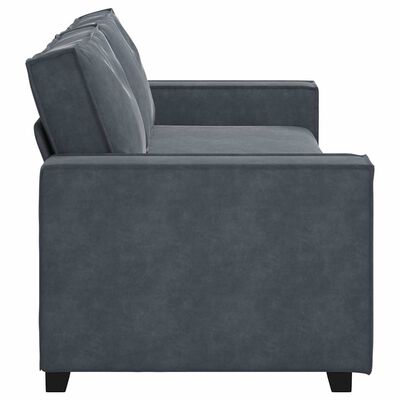 Side view of blue-gray sofa showing armrest, back cushions, and clean edge stitching.