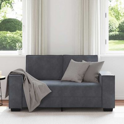 Blue-gray sofa facing forward with two back cushions and wooden legs visible.