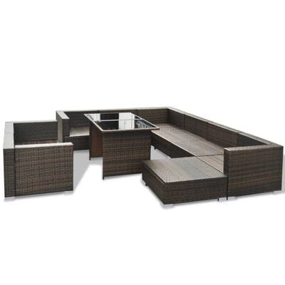 Large brown wicker outdoor sectional with built-in seating and a table with a glass top