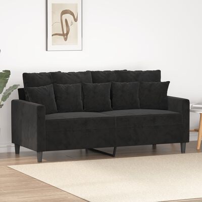 Black fabric sofa in a living room setting with multiple cushions