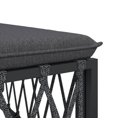 Close-up of lattice metal framework on corner of outdoor furniture with cushion edge
