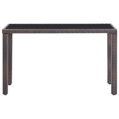 Close-up of the edge of a dark brown woven table frame with glass/top surface