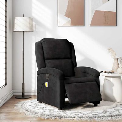 Living room scene with black recliner chair placed on a rug near a side table