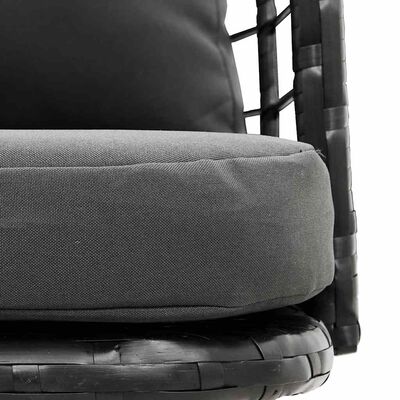 Close-up of cushion edge and texture on chair seat.