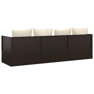 Dark brown wicker modular outdoor sofa with beige cushions
