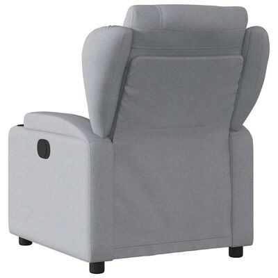 Back view of a grey recliner chair showing back panel and cord storage pocket.