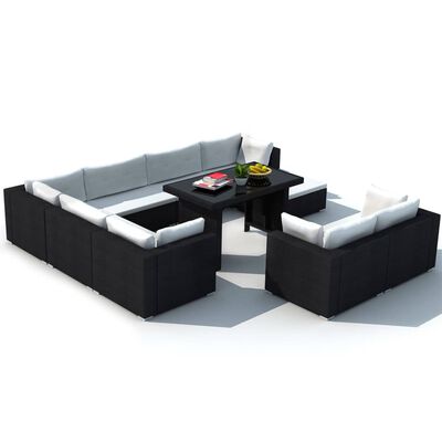 Outdoor sectional with white cushions around a central table.