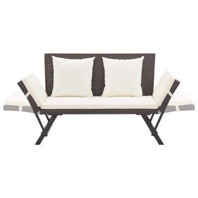 Front view of brown wicker sofa with beige cushions and white seating cushions