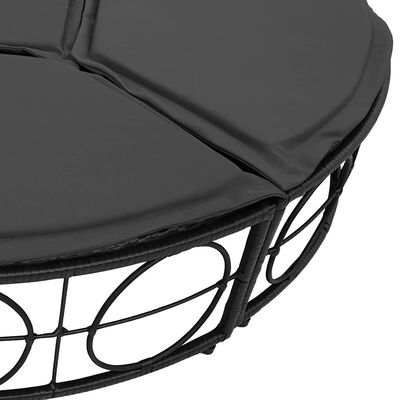 Close-up of the edge and stitching of the dark gray cushion on round sofa