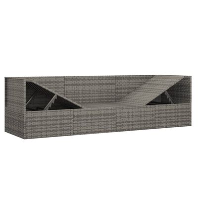 Rear view of a large outdoor wicker storage bench with hidden storage compartments.