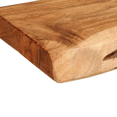 Close-up of wood edge showing grain and beveled corner