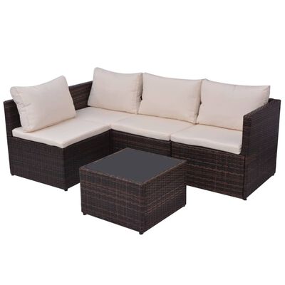 L-shaped brown wicker outdoor sofa with beige cushions and matching square glass-top coffee table