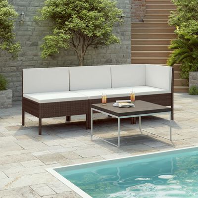 Brown wicker outdoor corner sofa with white cushions and a separate rectangular coffee table by a pool.