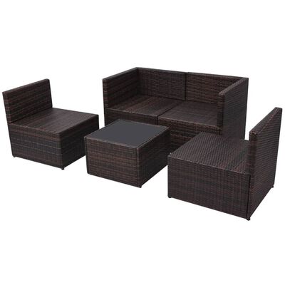 Set of brown wicker sectional pieces including two seating benches and a central coffee table