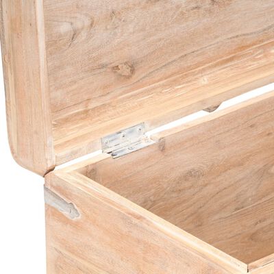 Close-up of hinge area and wood grain on the chest corner.