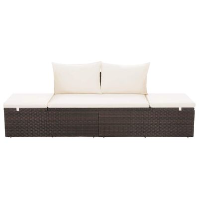 Outdoor modular wicker sofa with two back cushions and beige seat cushions, single long piece.