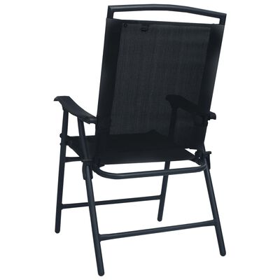 Full view of a black foldable patio chair with armrests.