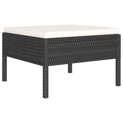 Rectangular outdoor ottoman with white cushion and wicker body.