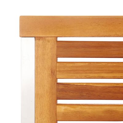 Close-up of wooden backrest slats and frame corner.
