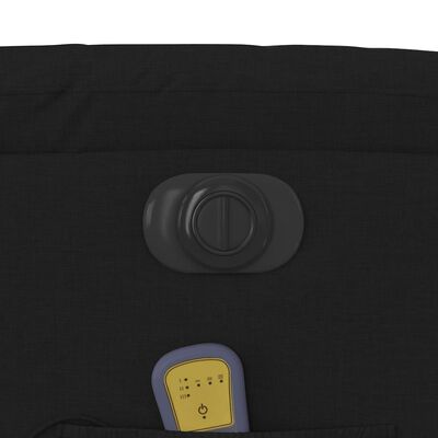 Close-up of the chair control dial embedded in the side panel