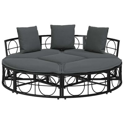 Round outdoor sofa with dark gray cushions and back cushions