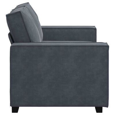 Side profile of blue-gray armchair/sofa showing armrest and side panel.