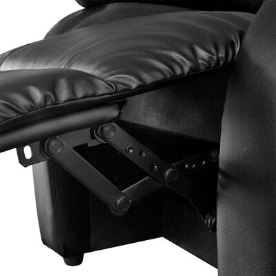Angle view of black reclining armchair with extended footrest and side storage pocket