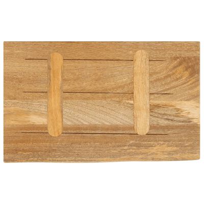 A wooden cutting board with two handles carved as loops.