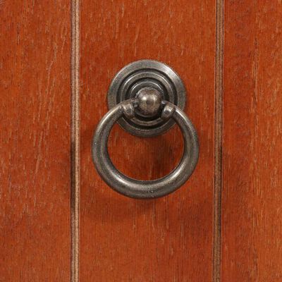 Oval metal ring handle mounted on wood paneler.