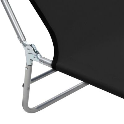 Close-up of the chair joint where metal frame connects to fabric.