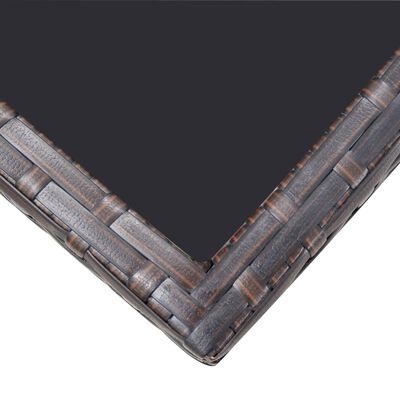 Close-up corner of dark brown woven seating furniture showing woven pattern and top edge