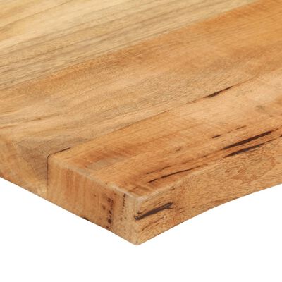 Close-up of wooden edge and corner showing wood grain and beveled edge