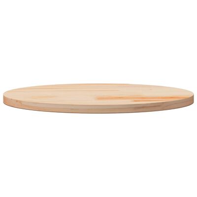 A round wooden cutting board lying flat showing edge and wood grain.