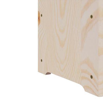 Close-up of bottom corner of wooden wine rack with screws