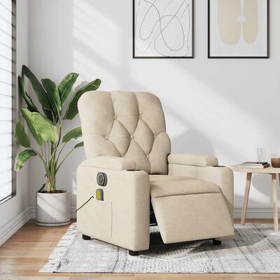 Living room setup with beige recliner in foreground; plant and wall art in background