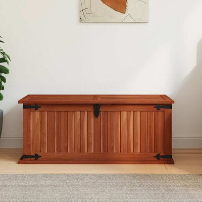 Wood storage chest with lid closed from front view.