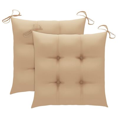 Two beige tufted seat cushions