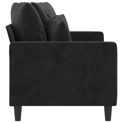 Side/back perspective of black sectional sofa armrest and back cushions