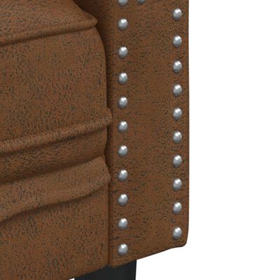 Close-up of the leather texture with brown and black mottling.