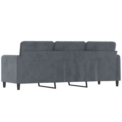 Back side view of a blue-gray sofa showing the legs and support structure.