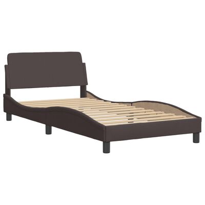 Brown upholstered bed frame viewed from side with curved footboard.