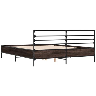 Angle view of a metal bed frame with dark wood panels and headboard