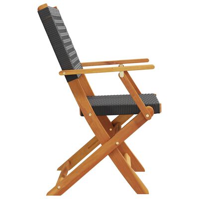 Side angle of a dark woven outdoor chair showing armrests and wooden frame