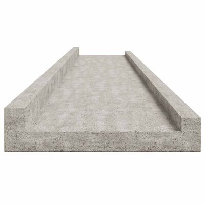 Another angled close-up of a concrete shelf edge, showing worn texture.