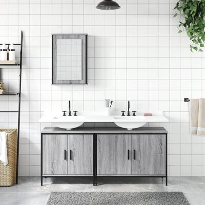 Bathroom vanity with double sink, wall mirror, and two-door cabinet base in grey wood finish.
